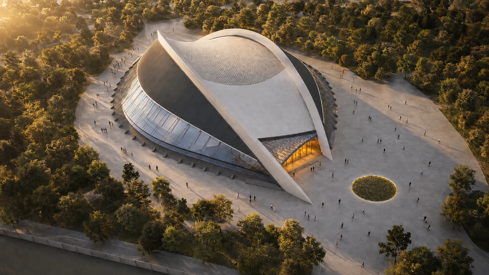 Aerial view of the main arena and entrance plaza at golden hour